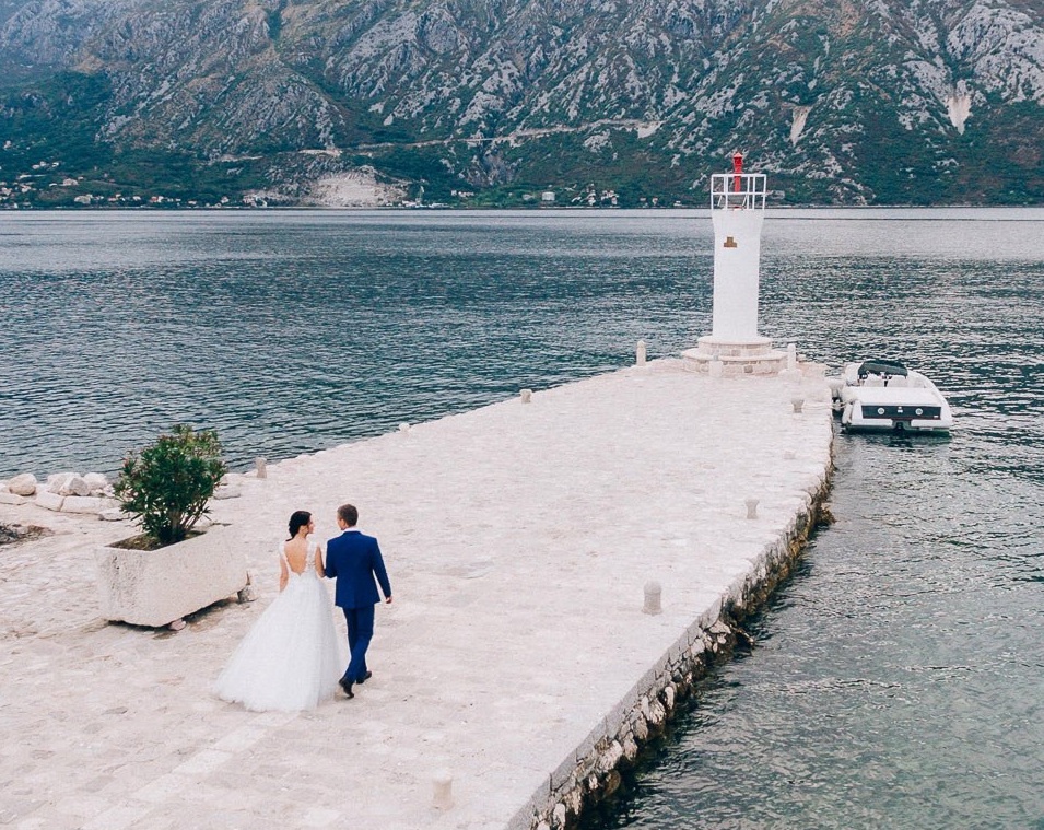 Bride and groom kissing.